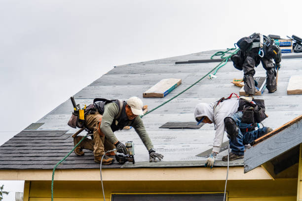 Professional Gutter Installation technician working in Arlington, IN